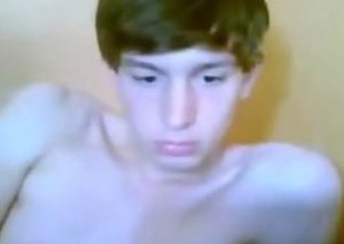 twink is jerking off on the fat dick on webcam