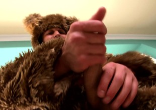 Muscled G takes not present his bear suit to fist-pump his fixed cock